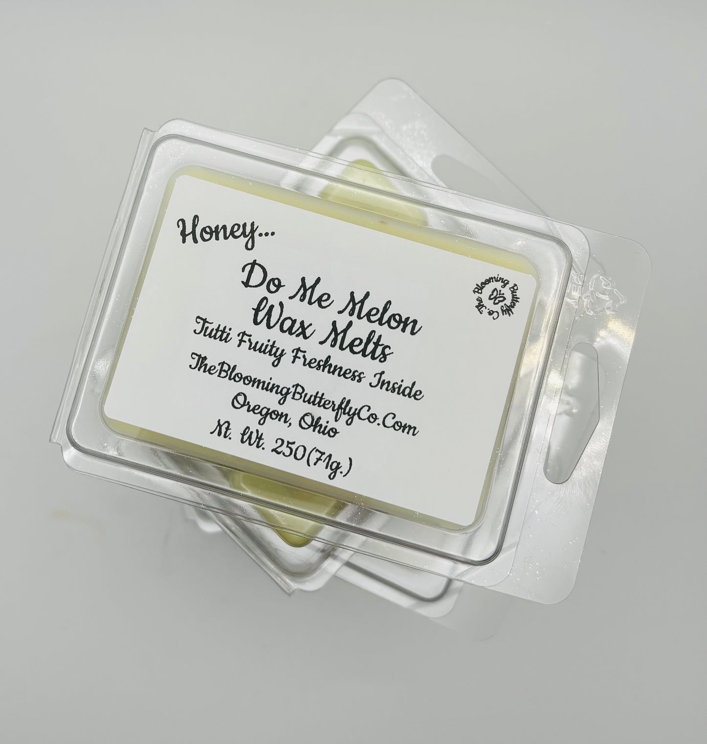 fruity shimmering Honey Do Me Melon wax melts packaging with label handpoured in a 6 count clamshell made by the blooming butterfly company