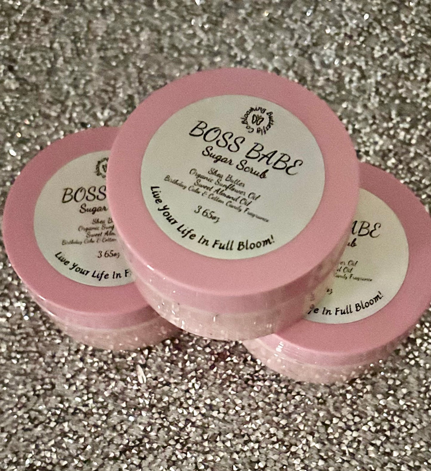 Cotton candy, birthday cake fragrance blend sugar scrub in clear jar with pink lid by The Blooming Butterfly Co