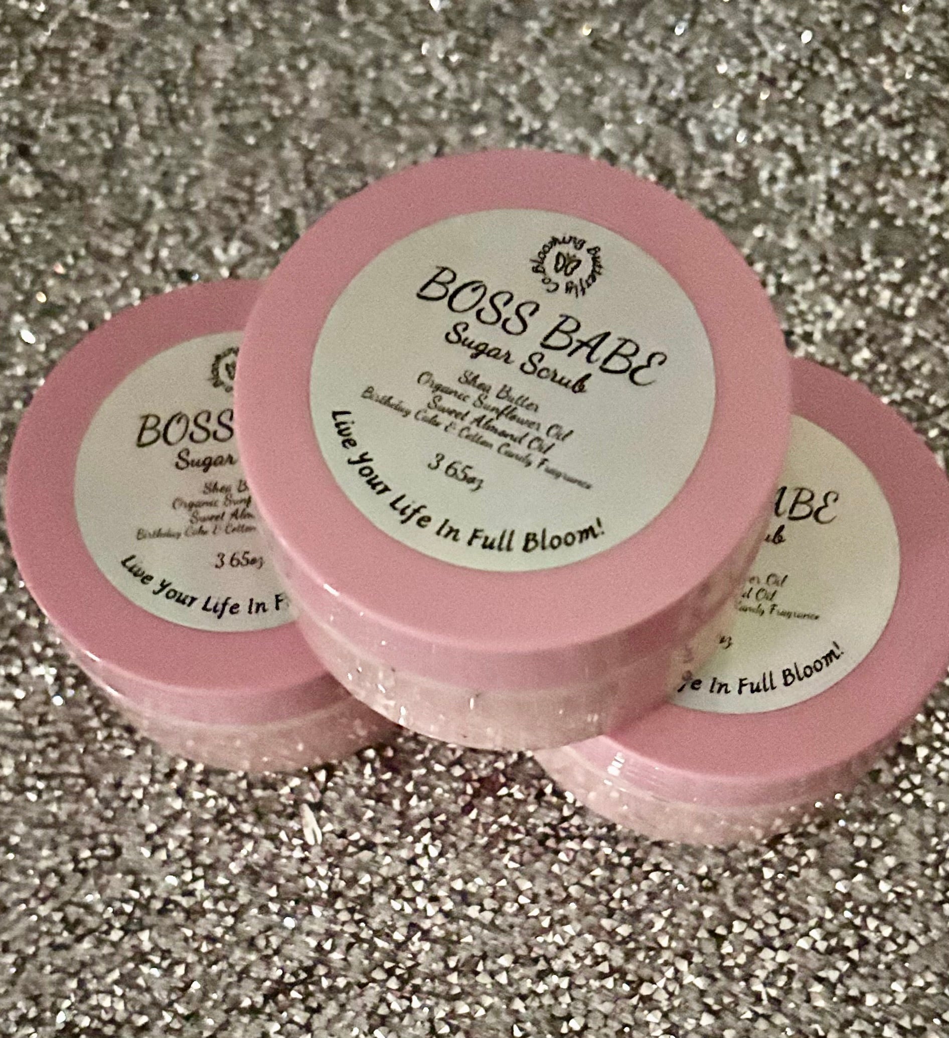 Cotton candy, birthday cake fragrance blend sugar scrub in clear jar with pink lid by The Blooming Butterfly Co