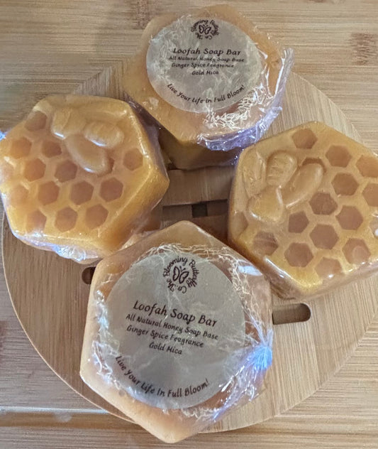 Honeybee shaped loofah soap bars infused with ginger spice fragrance and a touch of gold shimmer.