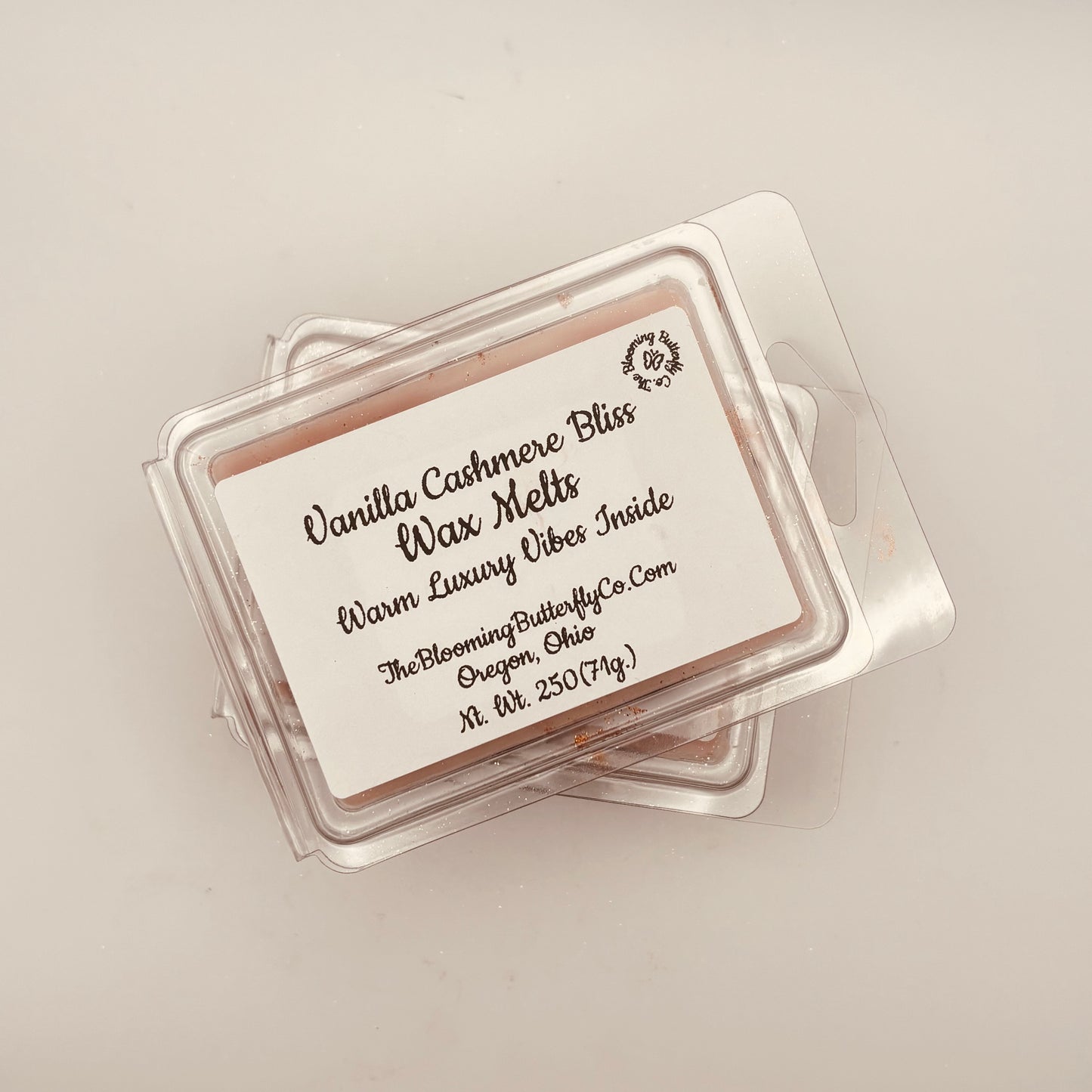 Vanilla Cashmere Bliss wax melts packaging on a light background handcrafted by the blooming butterfly company