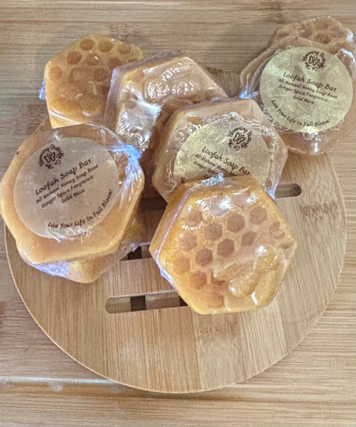 Honeybee shaped loofah soap bars infused with ginger spice fragrance and a touch of gold shimmer.