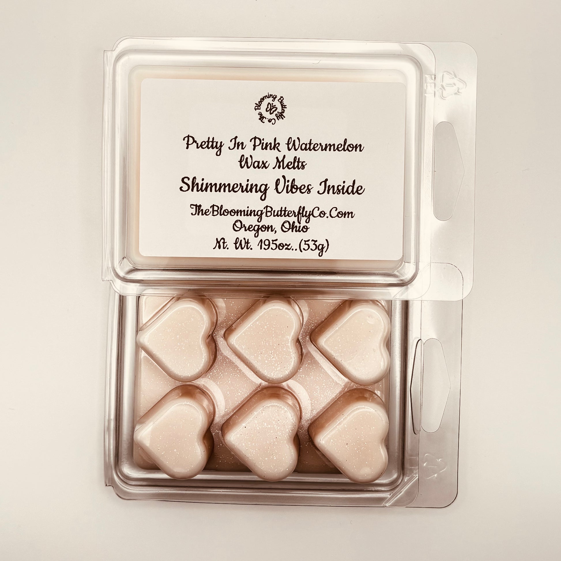 Pretty in pink watermelon heart shaped wax melts with pink shimmering glitter by the blooming butterfly company 