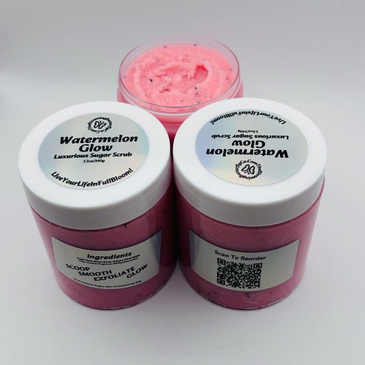 Three containers of Watermelon Glow sugar scrub on a white background with holographic labels handcrafted by the blooming butterfly company