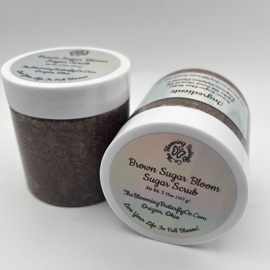 Brown Sugar Bloom Sugar Scrub with white lid on a white background handcrafted by the blooming butterfly company
