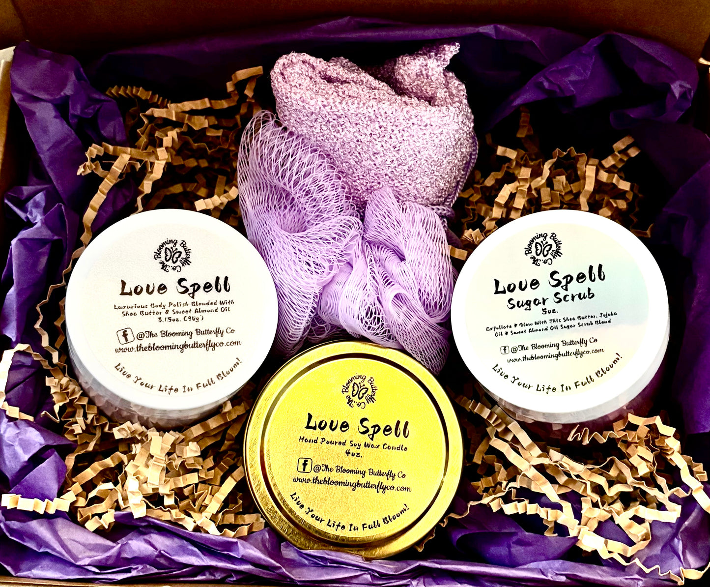  'Love Spell Gift Set  includes a candle, body butter,  and sugar scrub in a decorative box.