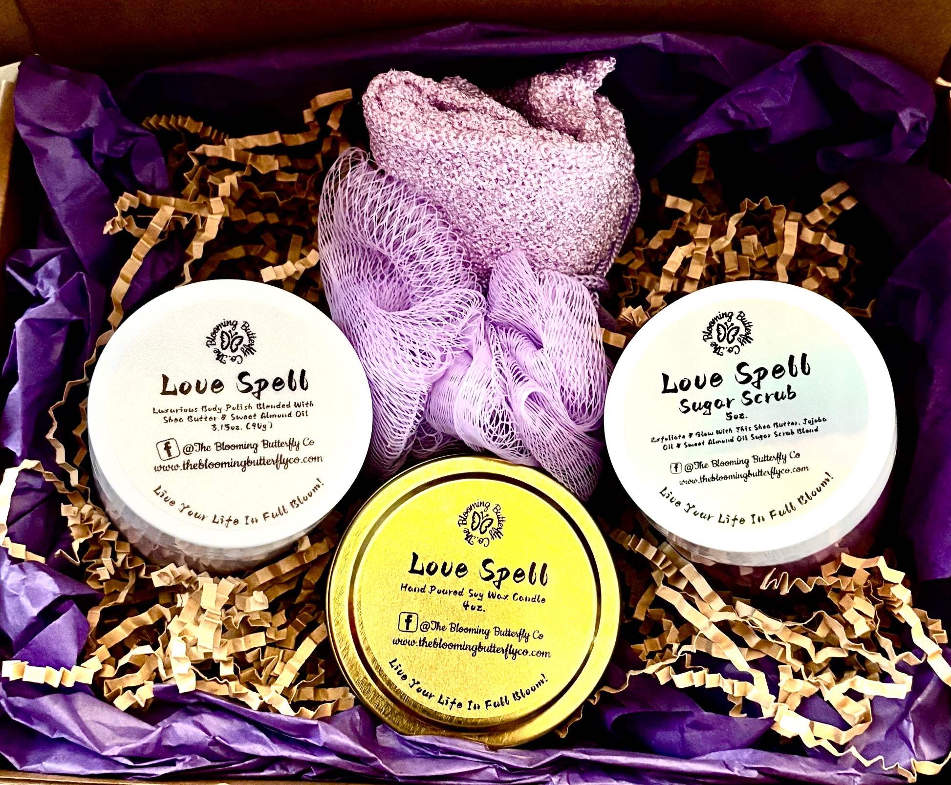  'Love Spell Gift Set  includes a candle, body butter,  and sugar scrub in a decorative box.
