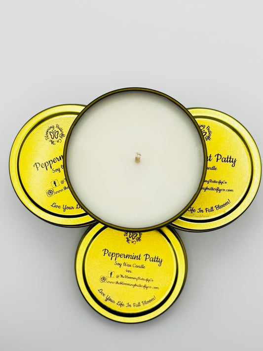 peppermint candle in 4oz gold tin