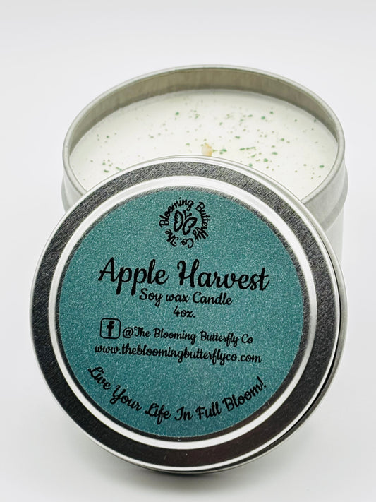 apple harvest soy wax candle in a 4oz. container with green glittery mica on top