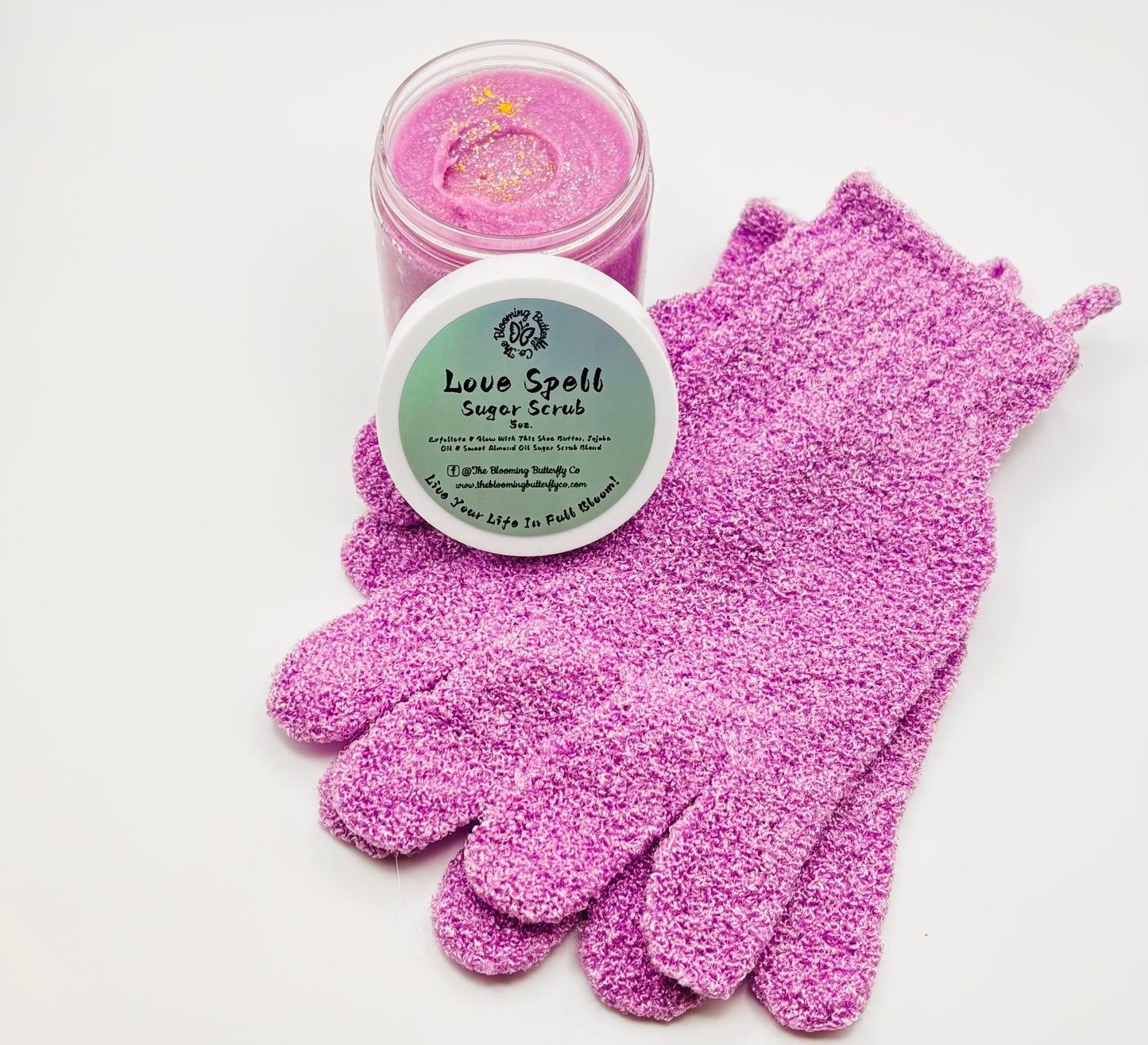 love spell sugar scrub with exfoliating bath gloves