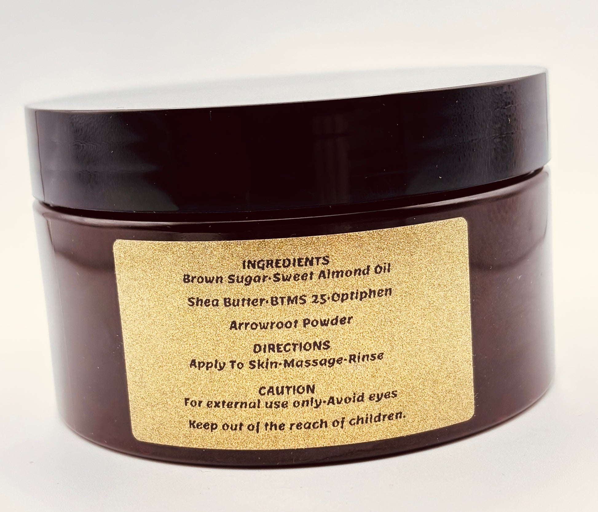 brown sugar scrub in amber colored jar