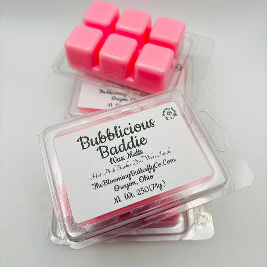 6 shimmering hot pink wax melts in square clam shells with label made by the blooming butterfly company
