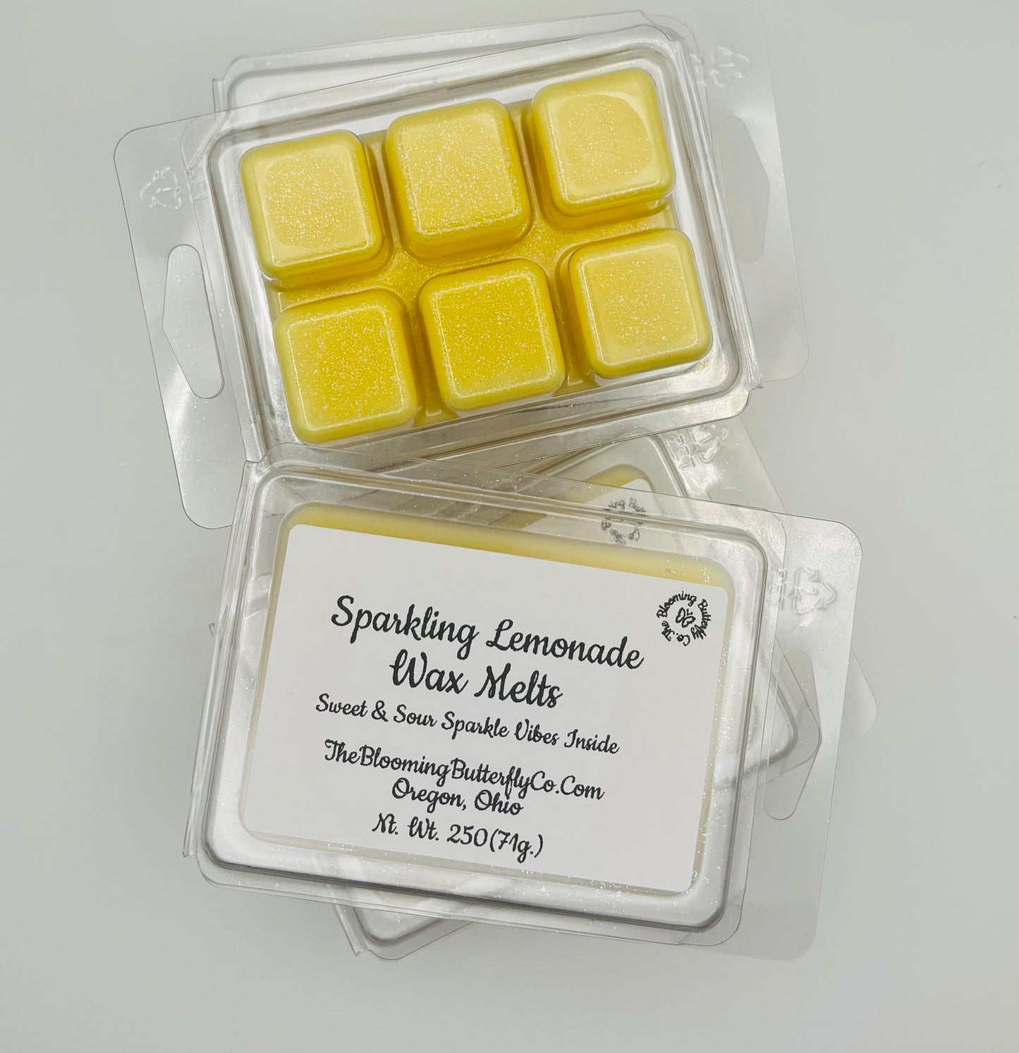 bold smelling sparkling lemonade wax melts with label packed in a clamshell made by the blooming butterfly company