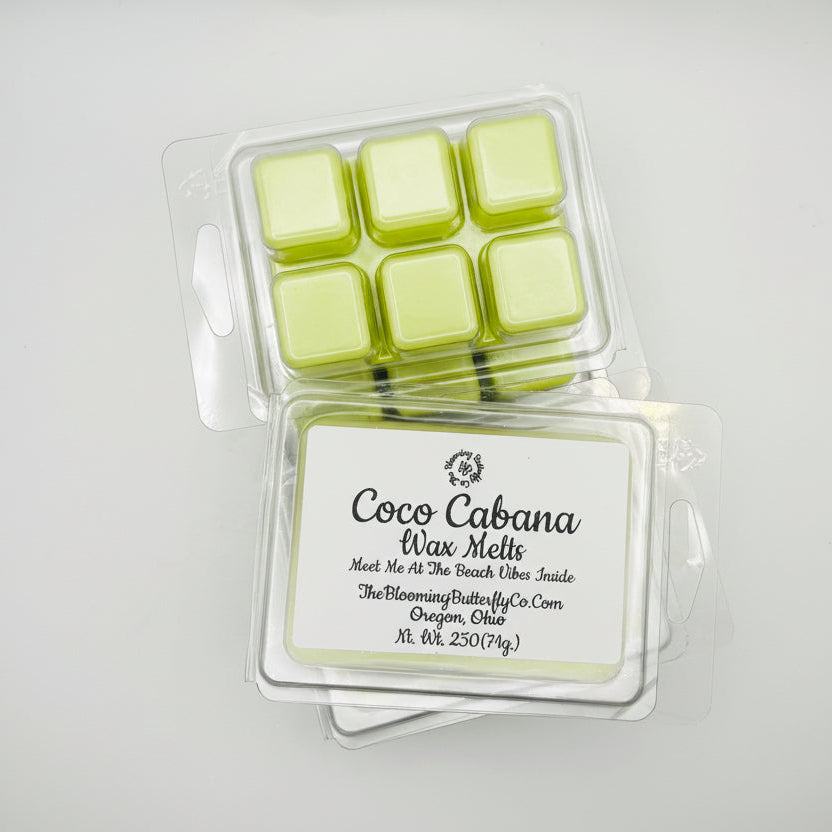  6 Pack of shimmering tropical Coco Cabana wax melts with a label made by the blooming butterfly company