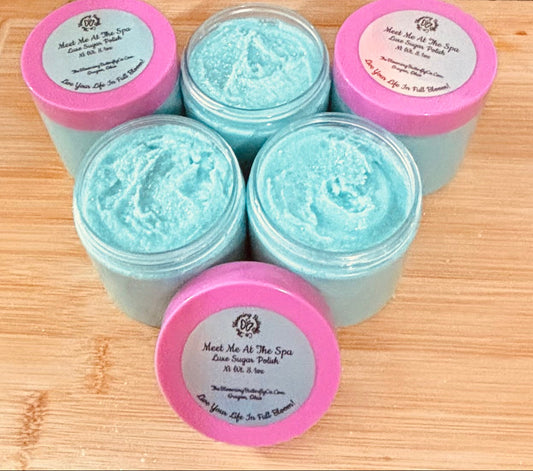 5 containers of Meet me at the spa sugar polish colored in shimmering sea glass mica with barbie pink lids handcrafted by the blooming butterfly  company