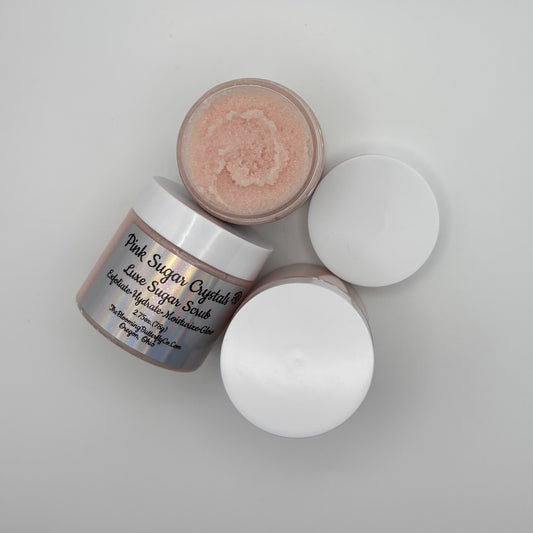 Two jars of Pink Sugar Crystals Luxe Sugar Scrub handcrafted by the blooming butterfly company