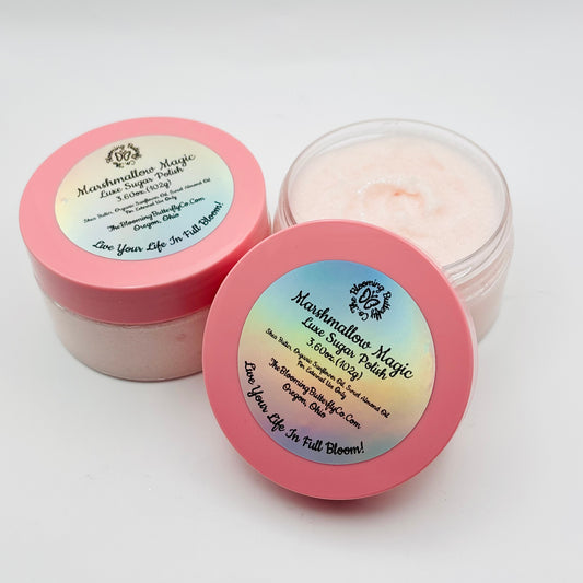 Two containers of Marshmallow Magic sugar polish with pink lids on a white background Handcrafted by the blooming butterfly company