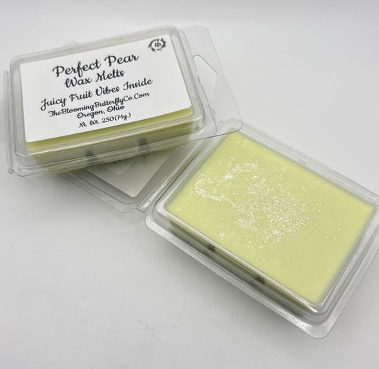 Two containers of Perfect Pear wax melts on a white background handcrafted by the blooming butterfly Company