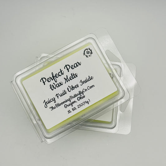 Perfect pair juicy fruit wax melts wax melts with a label on a gray background handcrafted by the blooming butterfly Company