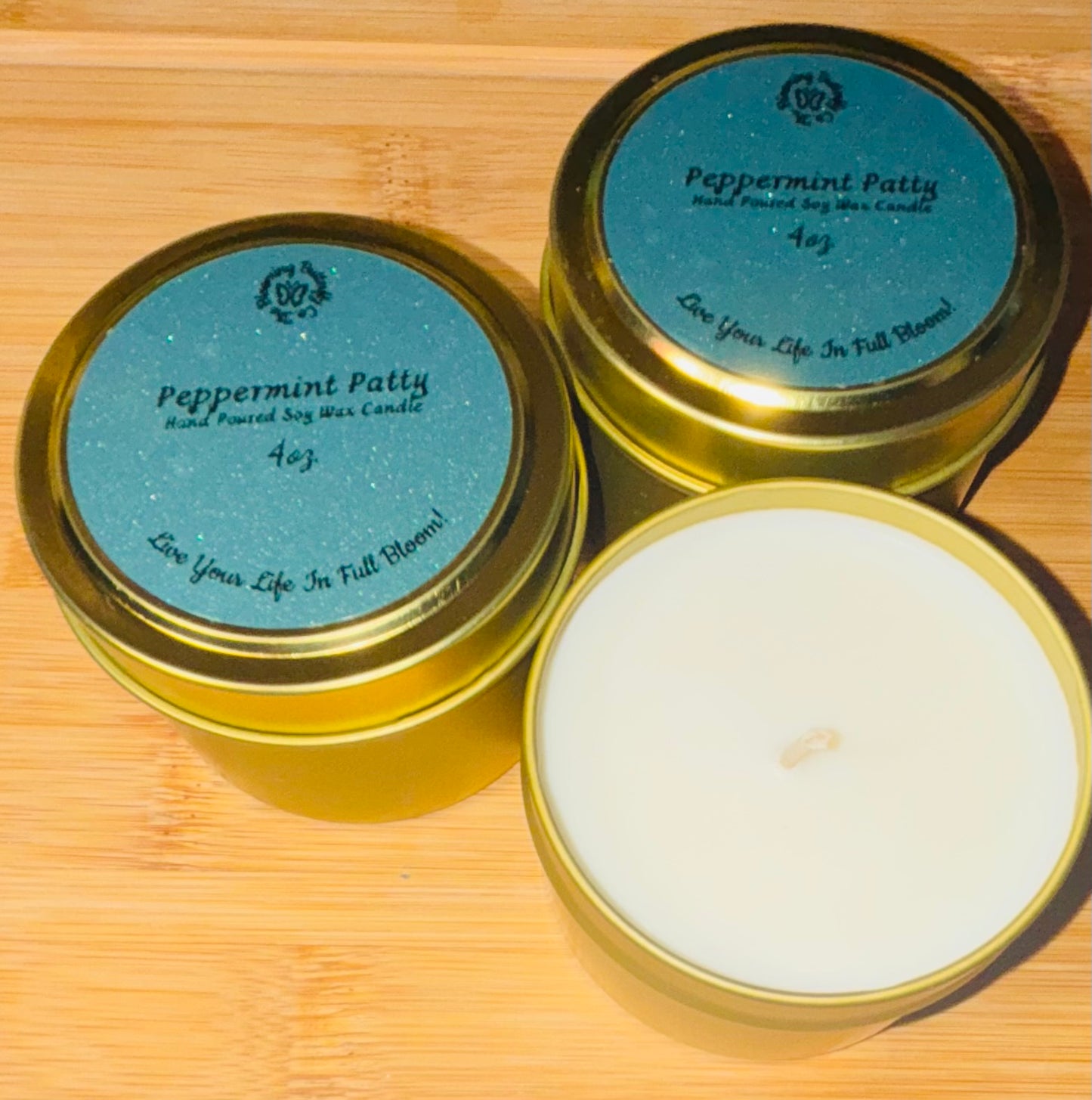 Invigorating, bold peppermint patty soy wax candles in gold 4oz. tin container