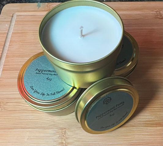 Invigorating, bold peppermint patty soy wax candles in gold 4oz. tin container