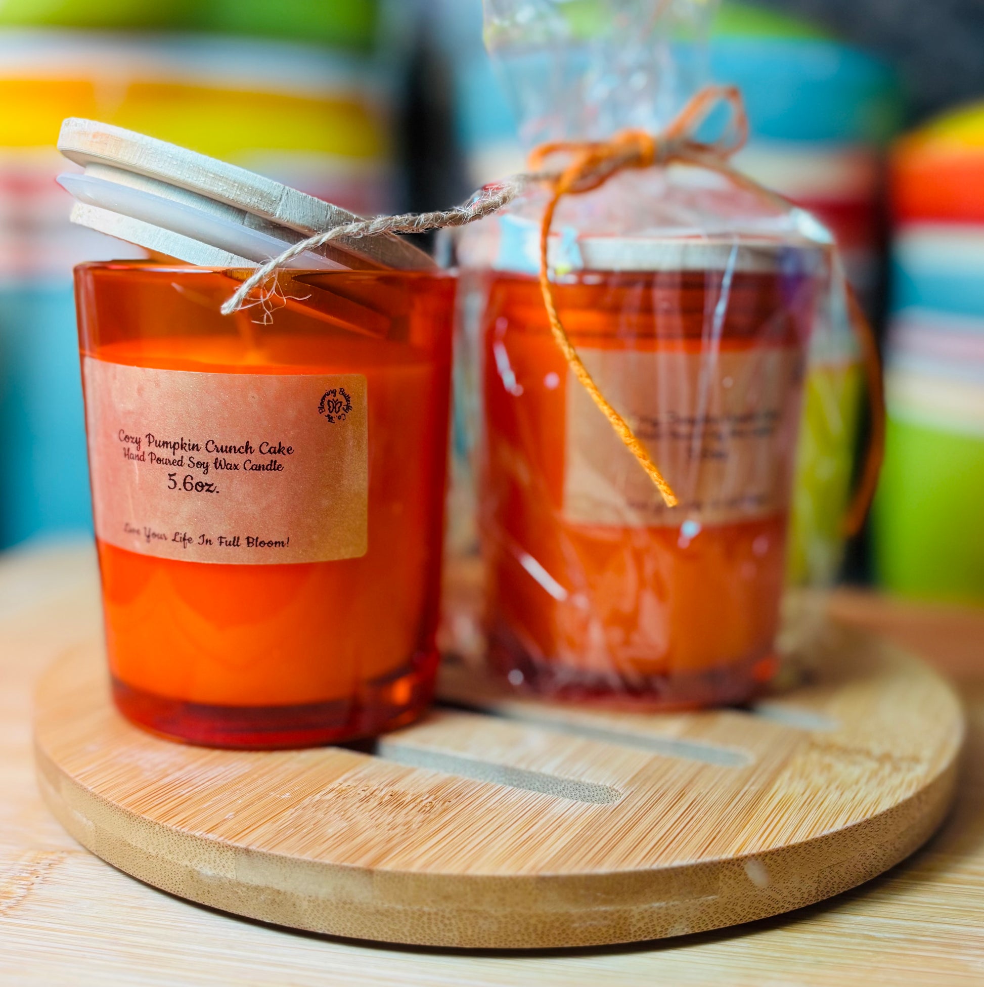 Pumpkin Crunch soy wax candle hand poured into these orange decorative glass jars with rustic wooden lid