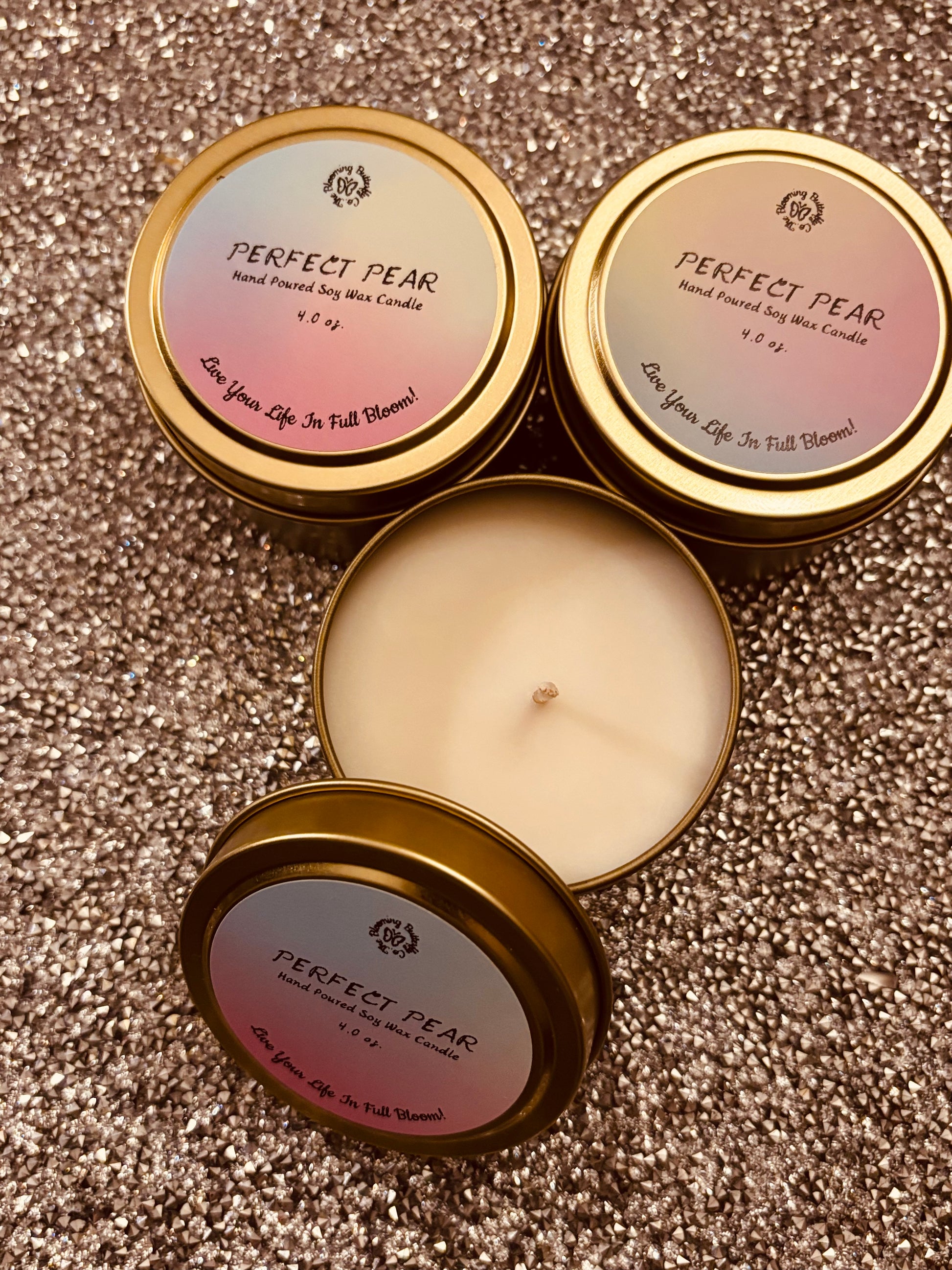 Soy wax candle infused with the bold fragrance of brandied pear hand poured into these decorative gold 4oz. tin vessels.