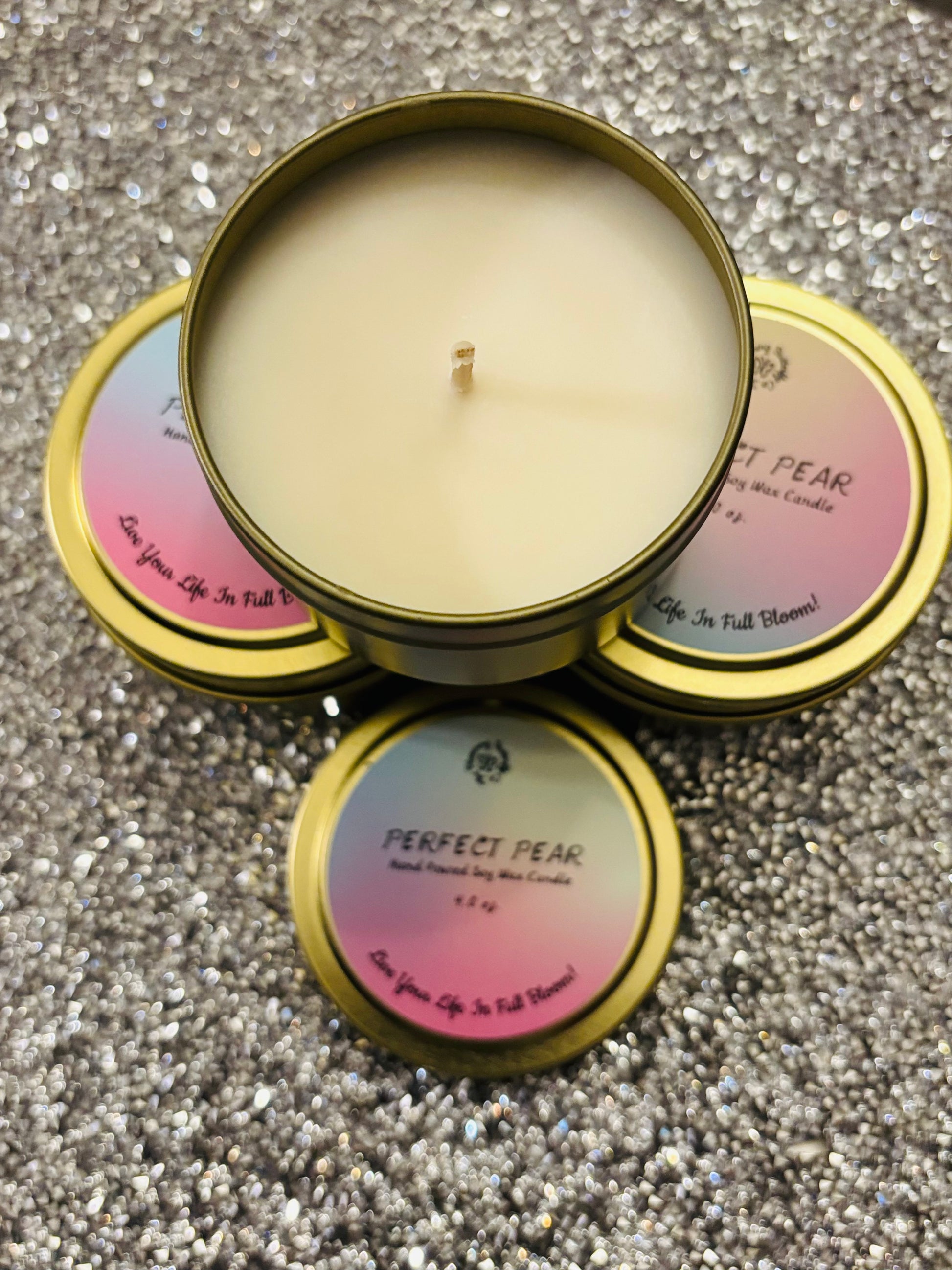 Soy wax candle infused with the bold fragrance of brandied pear hand poured into these decorative gold 4oz. tin vessels.