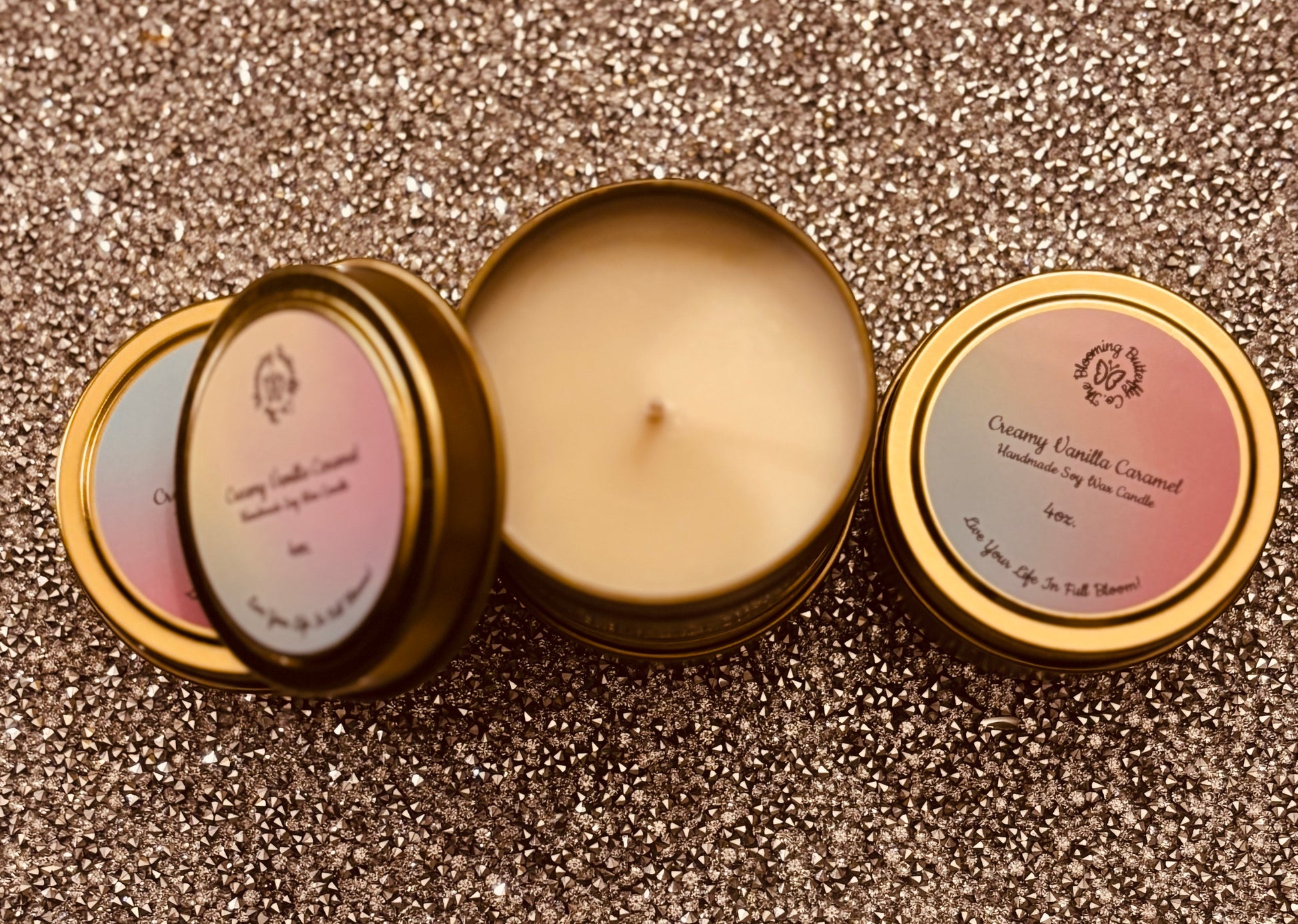 Creamy vanilla caramel soy wax candle in decorative gold 4oz. tin vessels.
