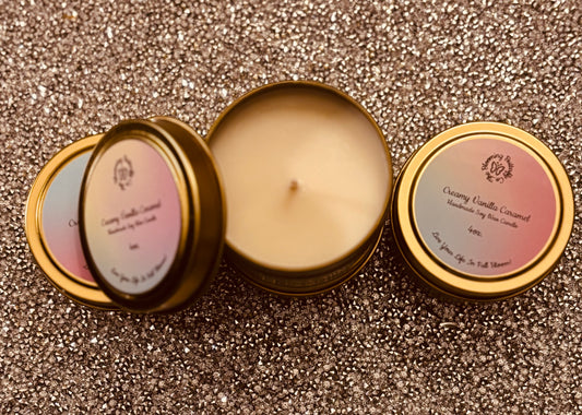Creamy vanilla caramel soy wax candle in decorative gold 4oz. tin vessels.