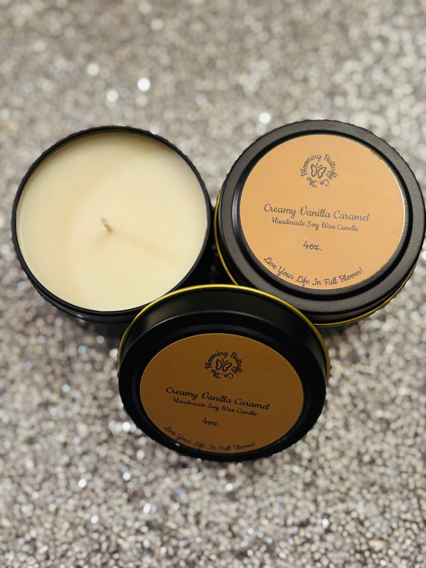 Creamy vanilla caramel soy wax candle in decorative 4oz tin vessels.