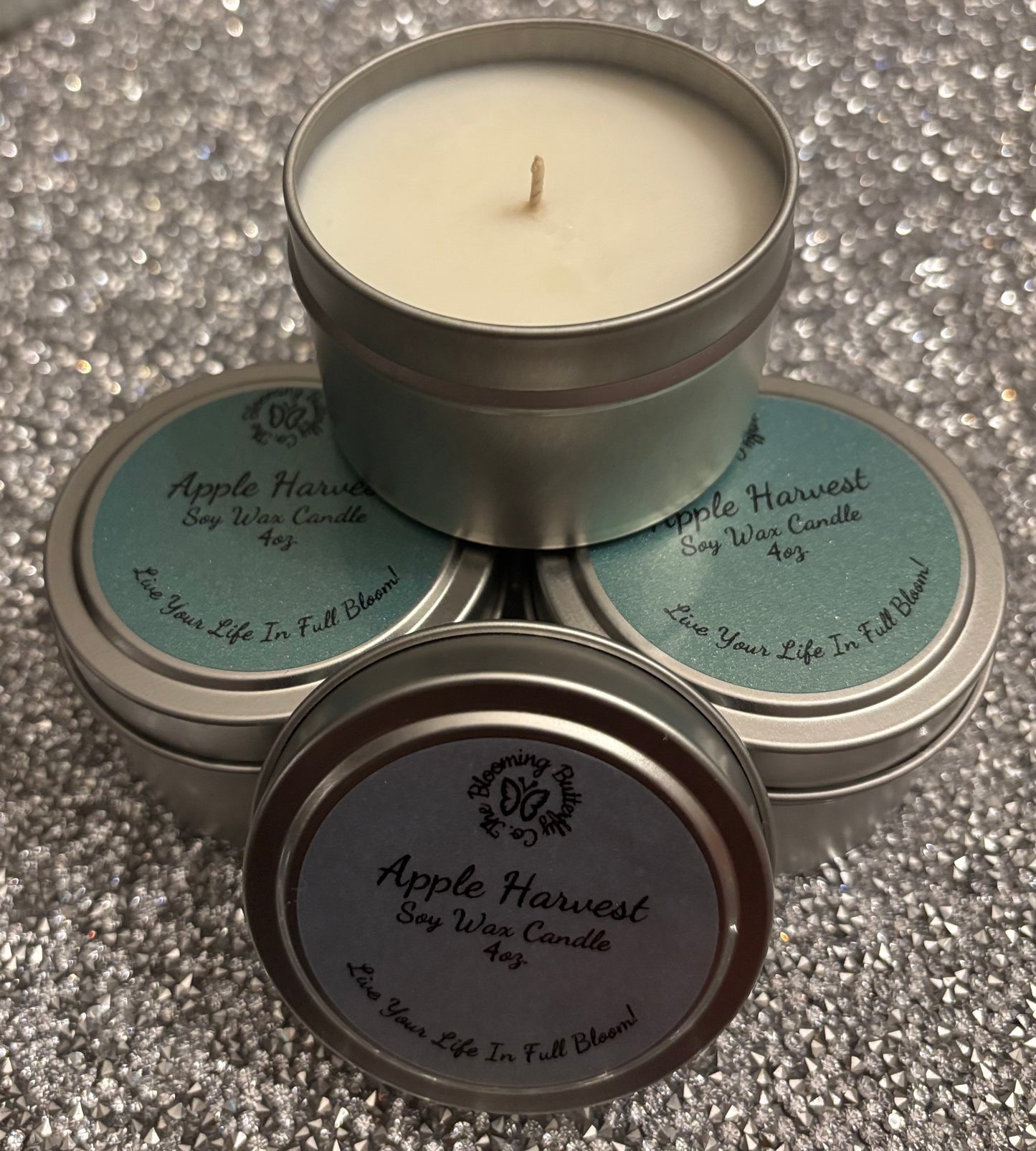 Apple Harvest soy wax candles in decorative 4oz. tin vessels with glittery labels
