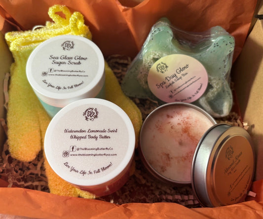 Creamy sugar scrub, whipped body butter, soy wax candle, bold fragrances, loofah soap bar in a bundle with exfoliating bath gloves