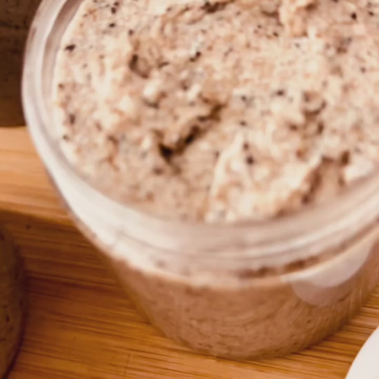 video of whipped coffee scrub with music in a clear jar with gold lid and label handcrafted by the blooming butterfly company

