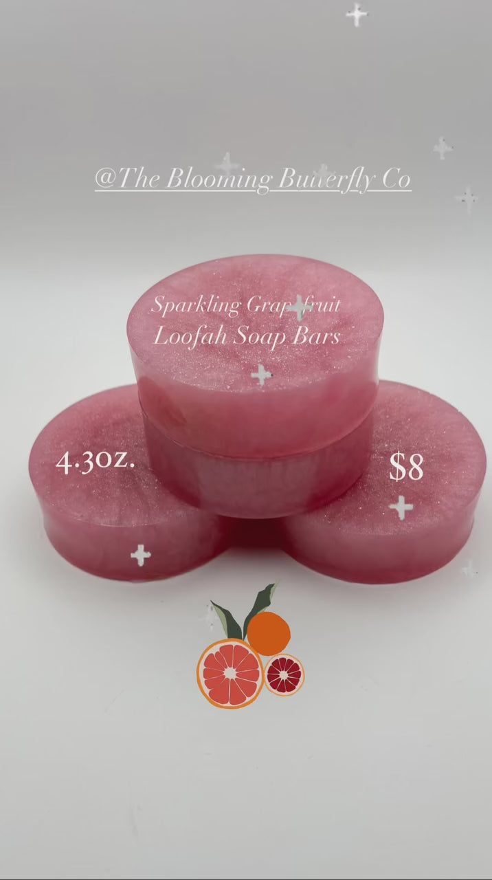 a video with music of a stack of pink sparkling grapefruit loofah soap bars by the blooming butterfly company